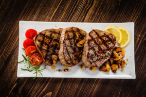 Grilled pork chops and vegetables